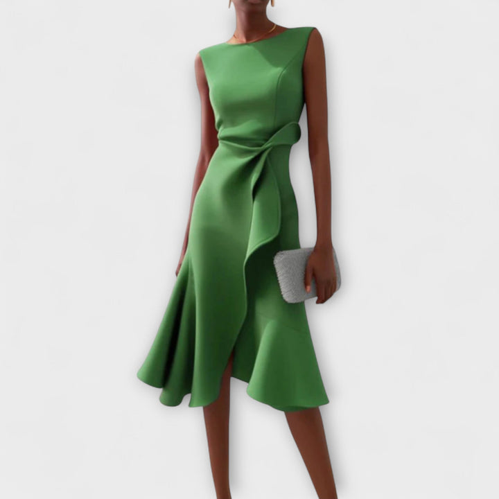 Close-up of elegant fabric on a women's draped asymmetric ruffle midi dress, ideal for formal wear.