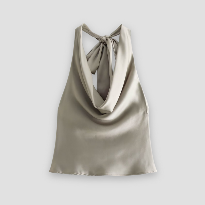 Fashionable women's satin halter top with a soft draped front; a must-have for summer elegance.