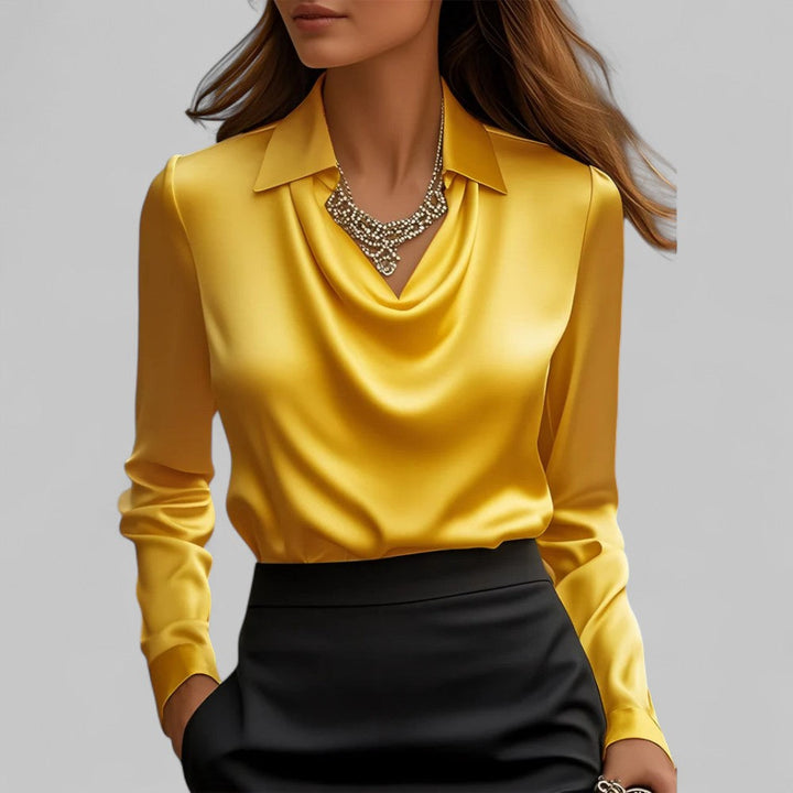 Women's casual yet elegant long sleeve satin blouse with a flattering draped neck.