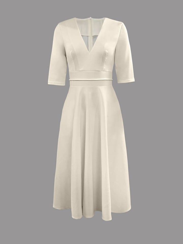Chic women's flared midi dress in white, a beautiful choice for special events