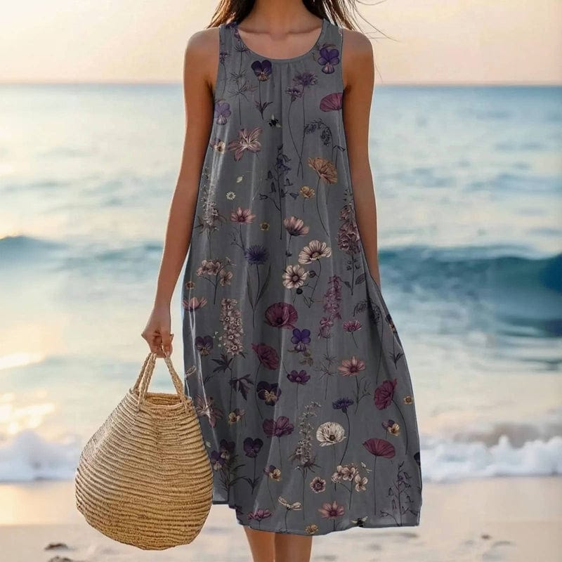 Flowy women's floral midi dress with a round neck. Comfortable & stylish, ideal for effortless summer casual wear.