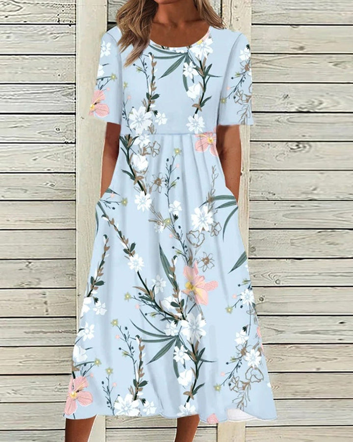 Elegant women's floral midi dress with short sleeves & round neck, perfect for summer casual or brunch. Flattering & comfortable.
