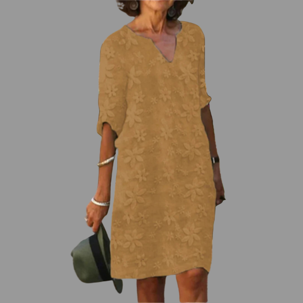 Beautiful women's floral midi dress, designed with a V-neck & half sleeves for an elegant, comfortable fit.