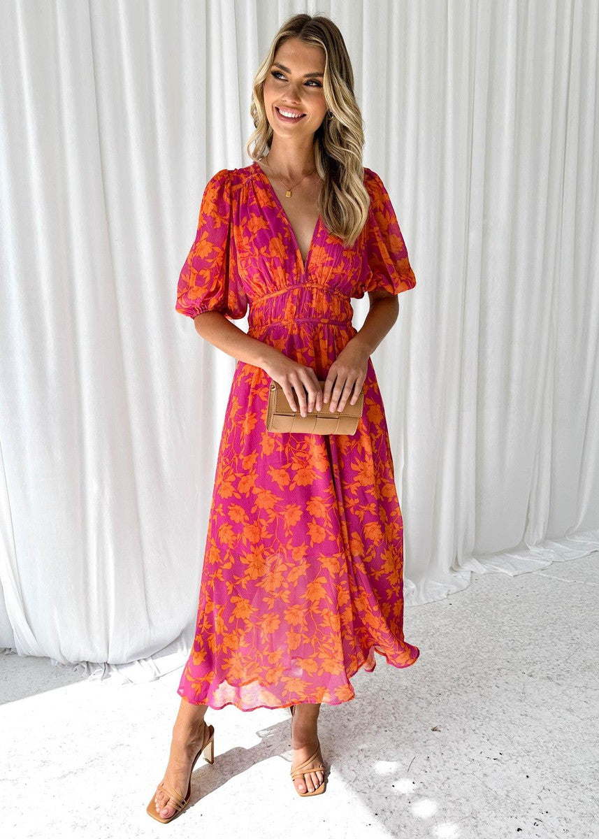 Orange floral midi V-neck dress for women, featuring elegant puff sleeves, ideal for summer weddings & special events.