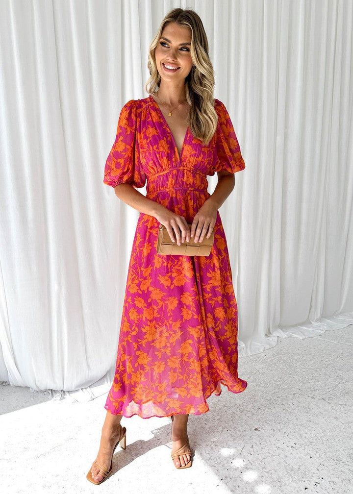 Orange floral midi V-neck dress for women, featuring elegant puff sleeves, ideal for summer weddings & special events.