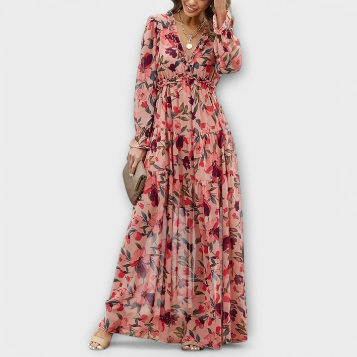 Elegant women's floral pleated maxi dress, perfect for summer parties or vacation wear.
