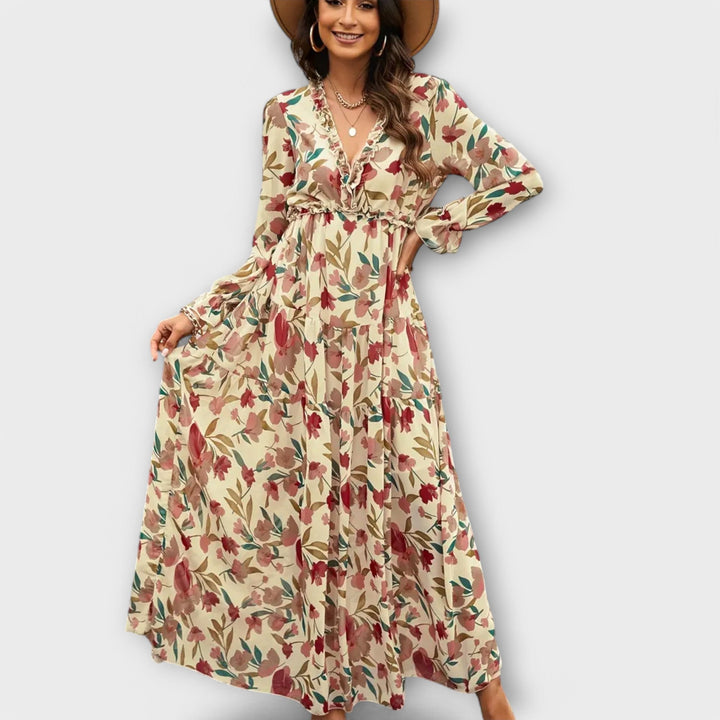 Chic floral print maxi dress for women, featuring a flattering pleated silhouette for effortless elegance.