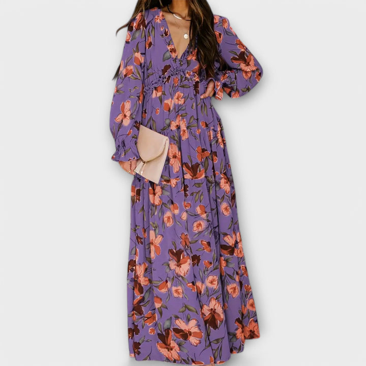 Vibrant floral women's maxi dress with elegant pleats, a must-have long summer dress for any occasion.