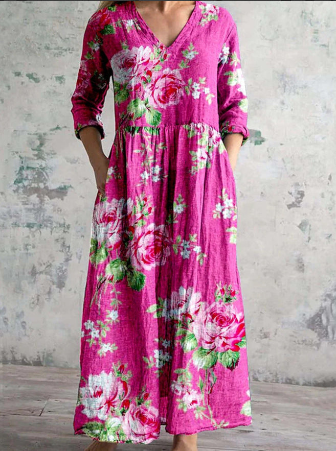 Comfortable women's long-sleeve maxi dress, elegant V-neck design, vibrant floral print, perfect for relaxed summer wear.