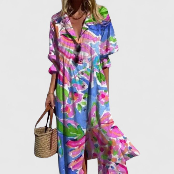 Woman twirling in an elegant flowy boho maxi dress, showcasing versatile bohemian style for summer.