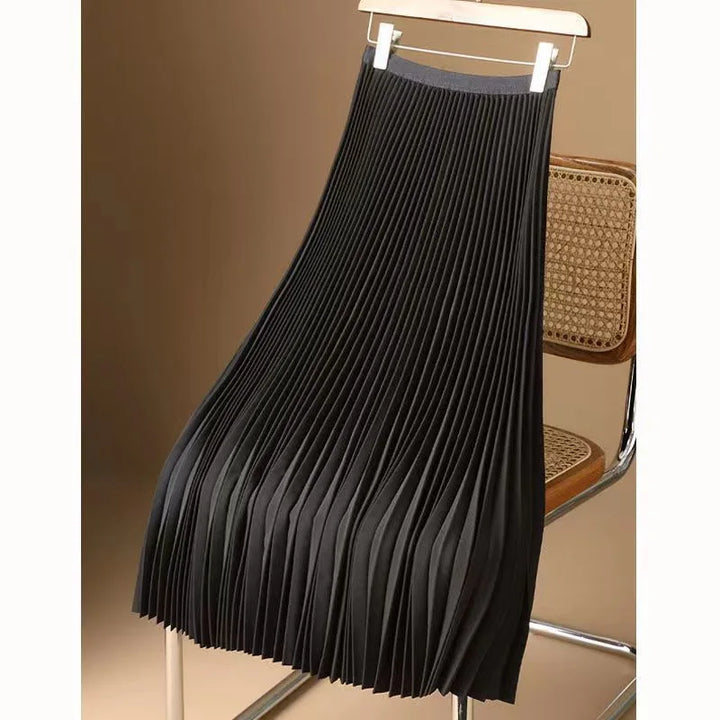 Elegant women's flowy pleated A-line midi skirt in a summer setting, perfect for chic fashion