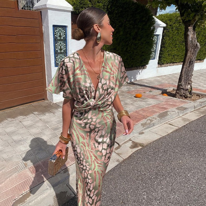 Chic women's elegant green dress. Comfortable flowy long formal gown, ideal for wedding guests & cocktail parties.