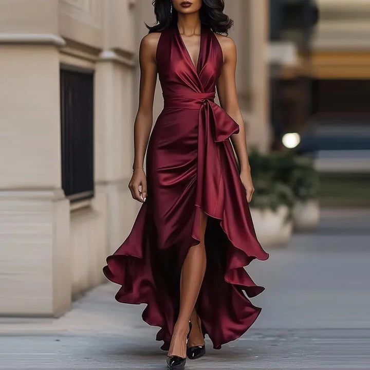 Luxurious women's formal dress: an elegant halter maxi gown with a sophisticated high-low hem.