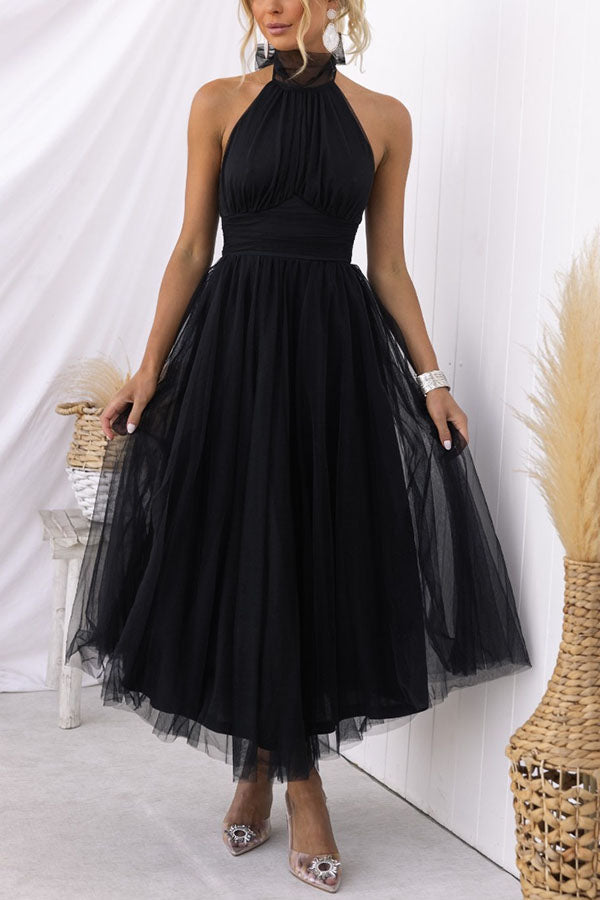 Graceful women's elegant halter maxi dress, a comfortable and stylish option for wedding guests.