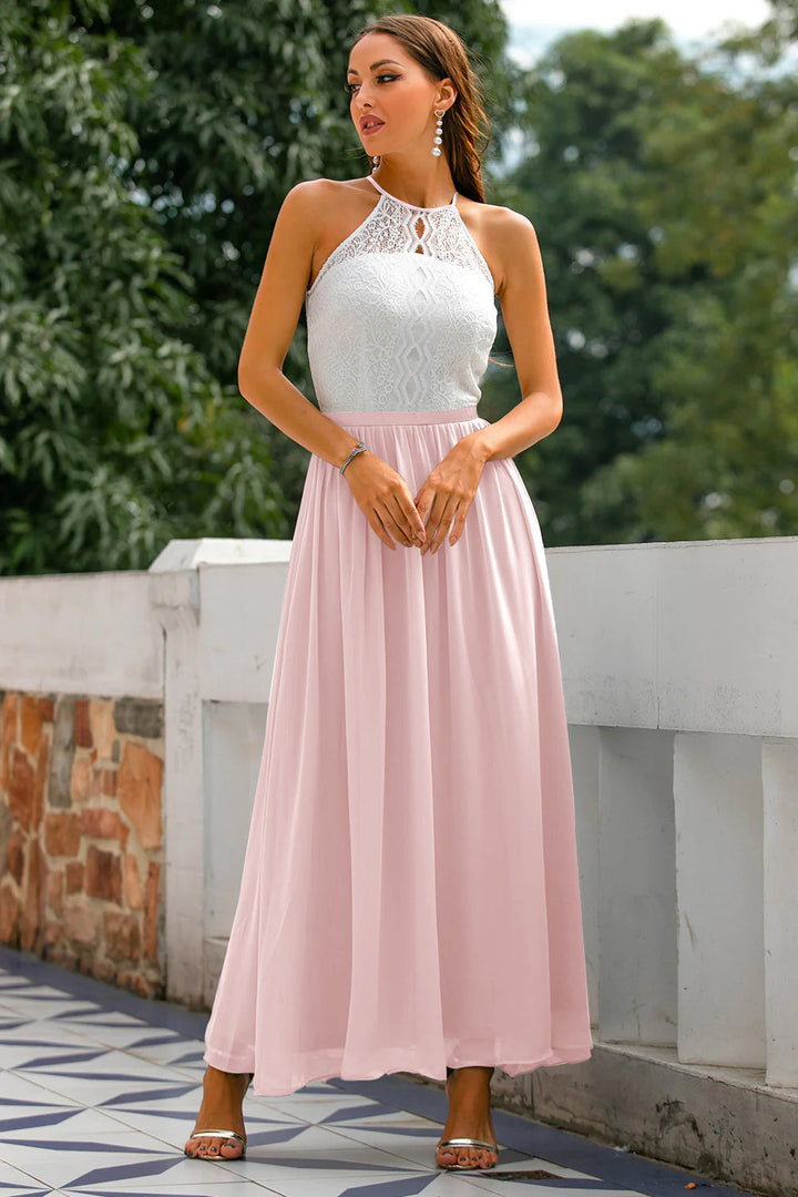 Flowing skirt detail of a women's halter maxi dress, adding elegance to its overall design.