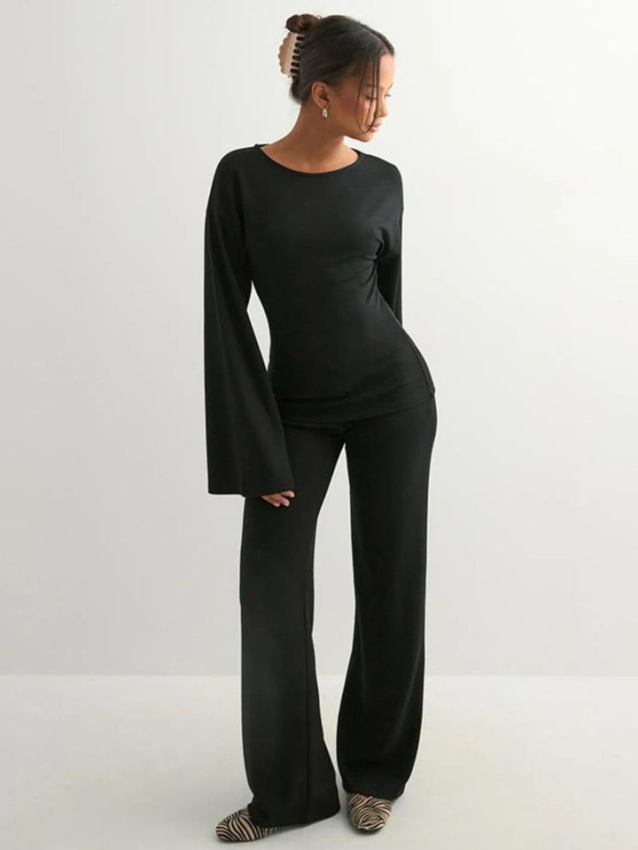 Soft knit women's lounge wear set, elegant top and flowy wide-leg pants, perfect for home