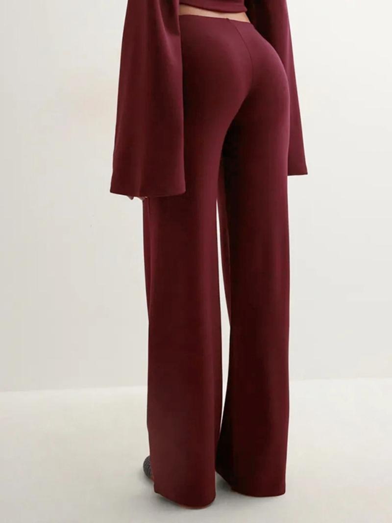 Stylish women's knit lounge set, elegant flared top and wide-leg pants for a cozy outfit