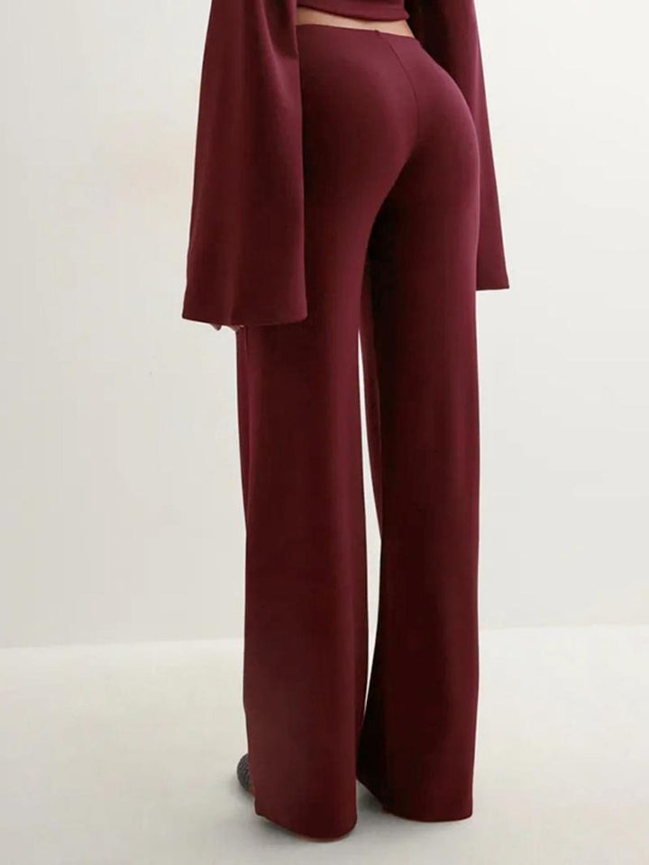 Stylish women's knit lounge set, elegant flared top and wide-leg pants for a cozy outfit