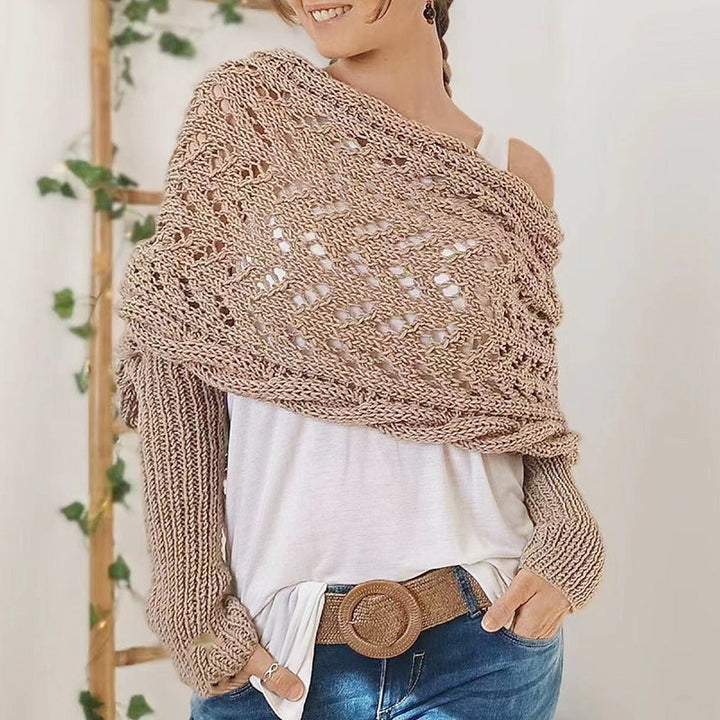 Fashionable women's shawl-style knitted scarf featuring sleeves, ideal for cold weather elegance.