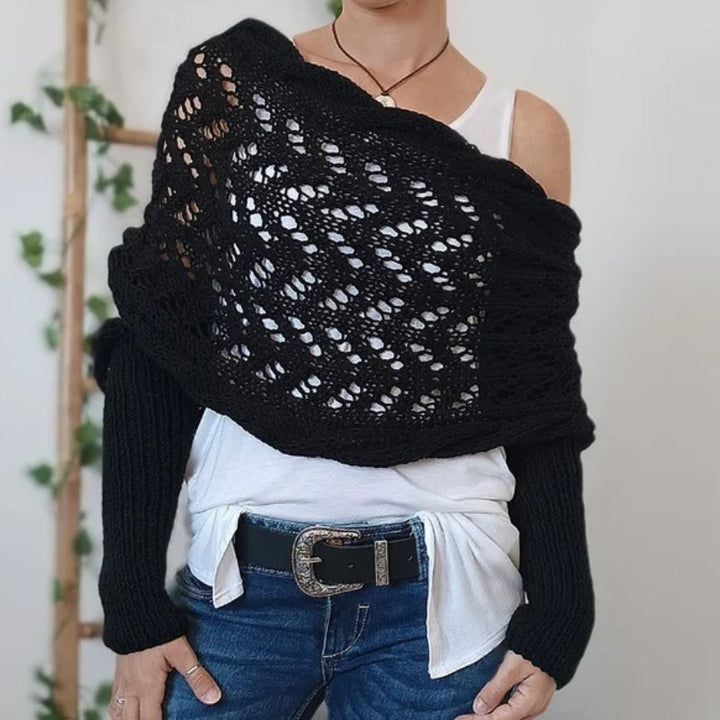 Cozy women's winter accessory: a knitted scarf with sleeves, designed for comfort and style.
