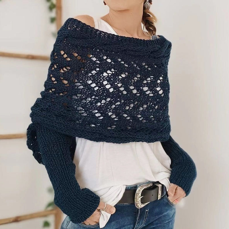 Stylish women's knitted scarf with sleeves, a modern take on a classic winter fashion staple.