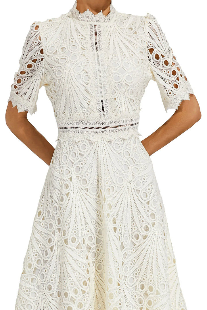 Stylish women's lace midi dress, an elegant option for formal spring/summer parties.