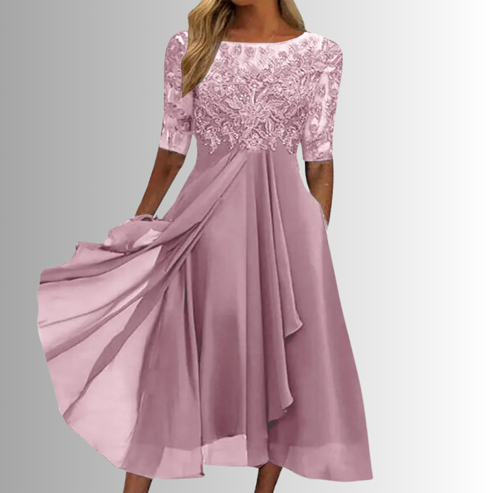 Chic women's midi dress featuring beautiful lace bodice, half sleeves & flattering layered A-line skirt. Ideal party wear.