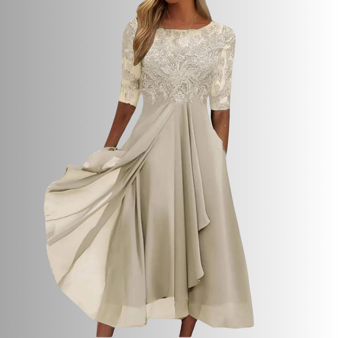 Elegant women's lace midi dress, half-sleeve design, flowing A-line skirt. Great for summer or occasion wear.