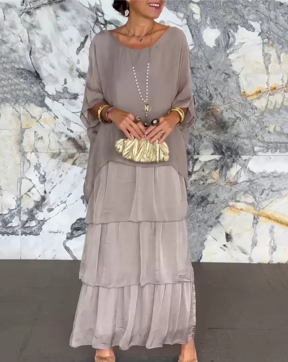Flowy A-line layered maxi dress for women. Elegant bohemian style, comfortable vacation & party wear.