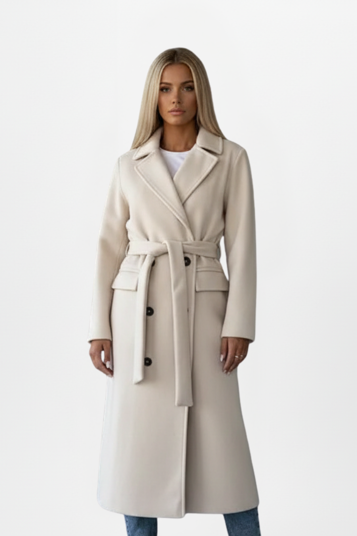 Classic women's long belted coat, double-breasted design. Sophisticated outerwear for elegant fashion.
