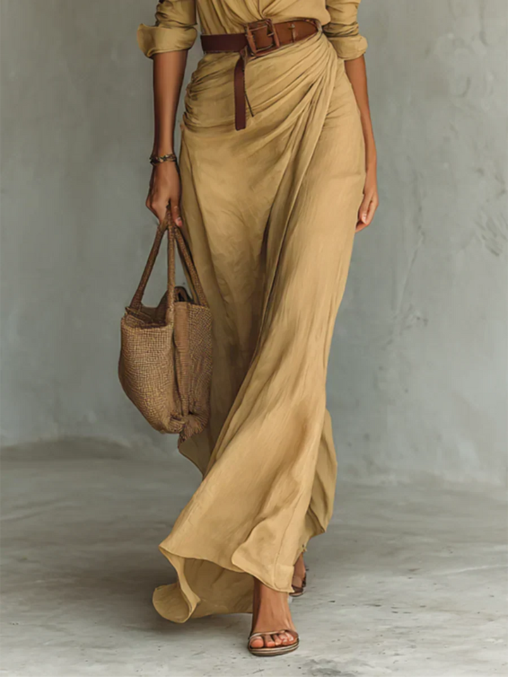 Sophisticated women's apparel: long sleeve belted maxi dress featuring a chic wrap style V-neck.