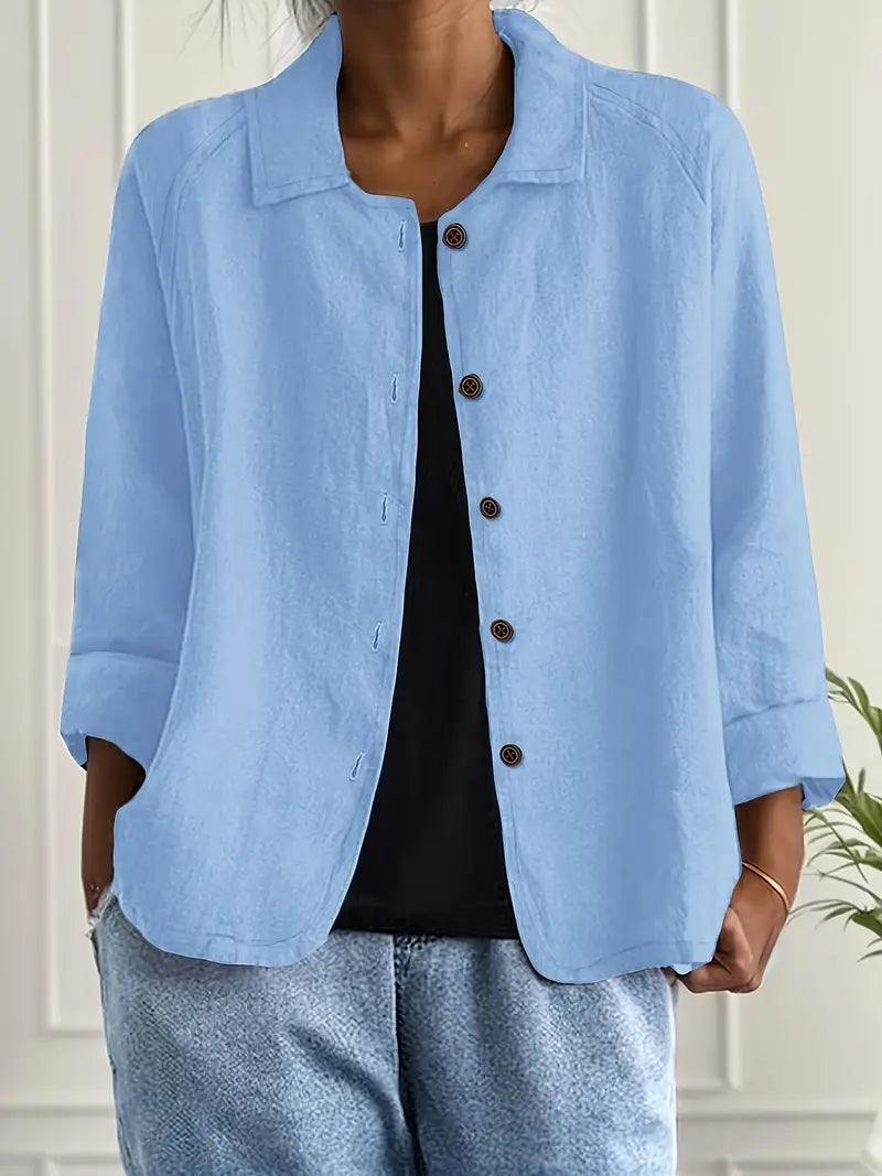 Elegant women's long sleeve button-up blouse, perfect for office wear or stylish casual outfits.