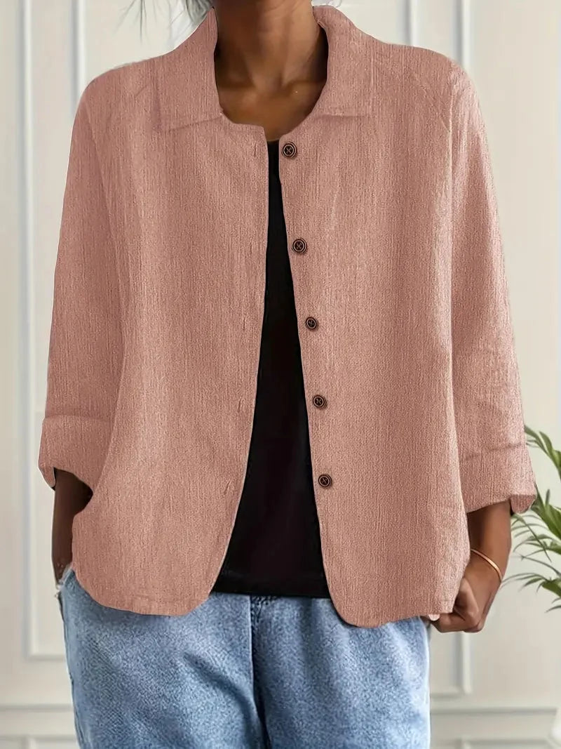 Women's versatile button-up blouse with a collared neckline and long sleeves, an elegant everyday top.