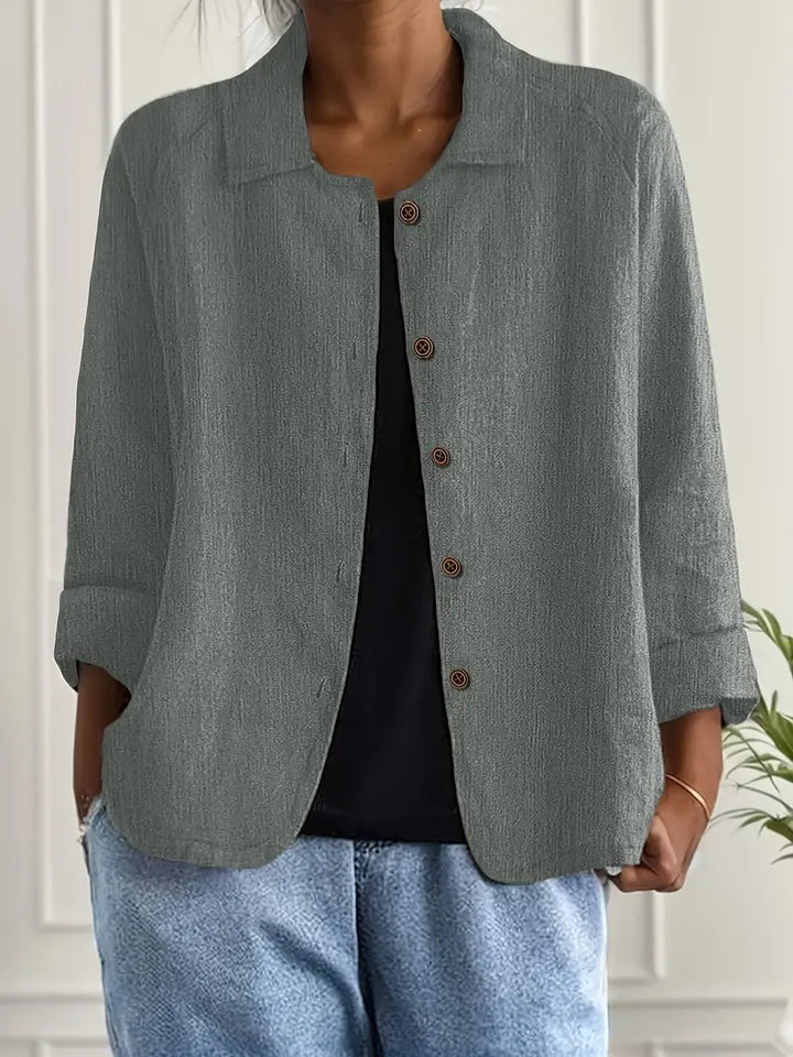 Fashionable women's collared long sleeve blouse, a classic button-up top for sophisticated daily fashion.