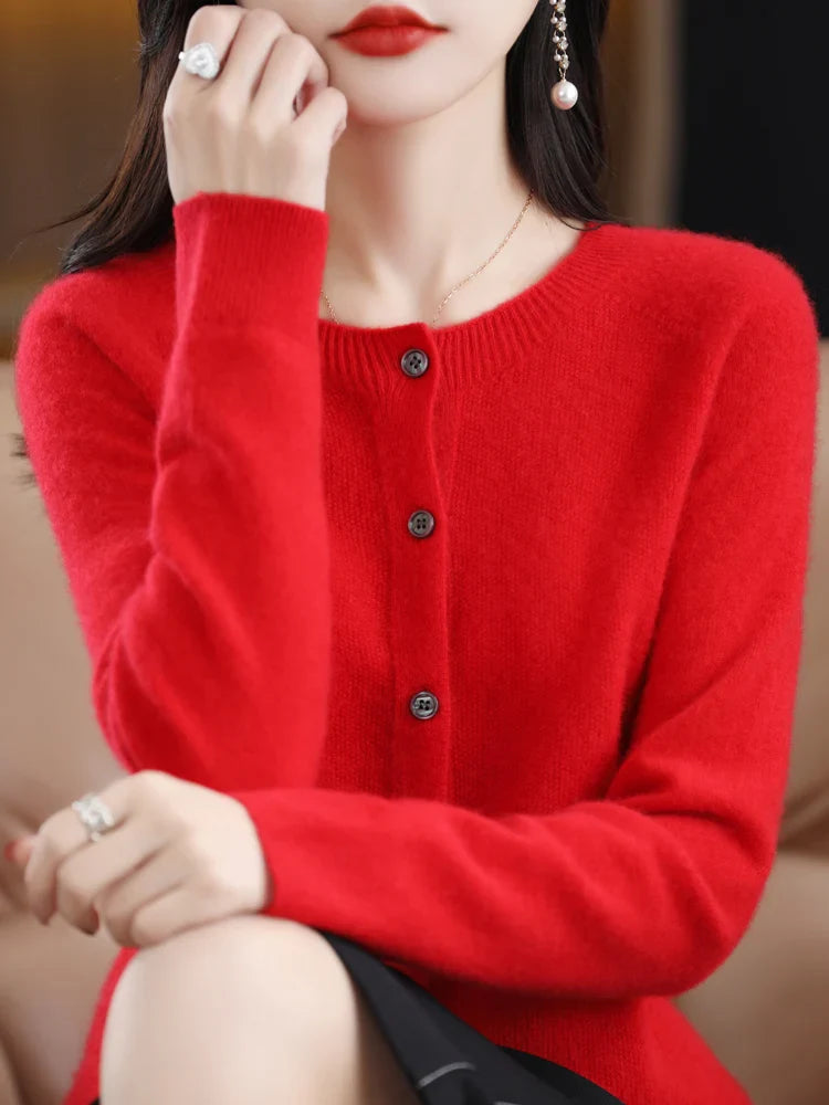 Folded women's soft merino wool O-neck sweater, presenting its luxurious feel and warmth