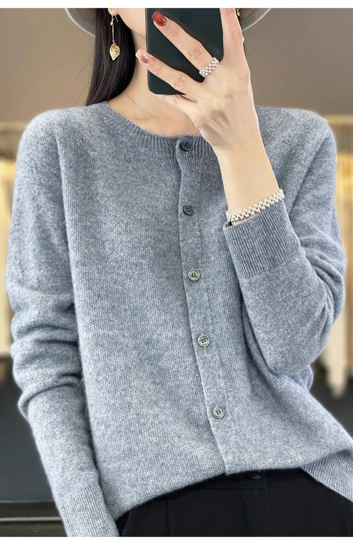 Front view of a women's elegant merino wool fine-knit sweater with a comfortable O-neck