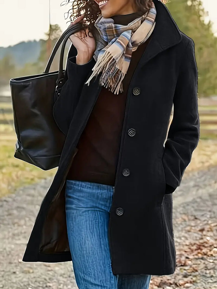 Trendy women's mid-length button coat, warm seasonal outerwear ideal for fall fashion & chic winter layering.