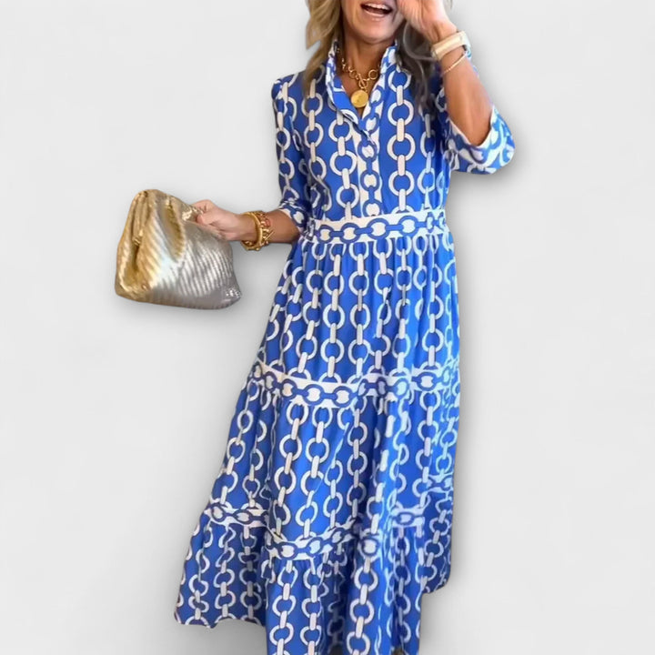 Elegant women's midi dress featuring a chic chain pattern. Perfect for sophisticated summer events & parties.