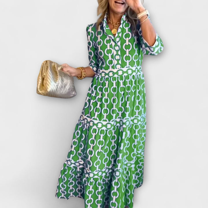 Stylish women's summer midi dress showcasing a detailed chain pattern. Perfect for elegant and casual wear.