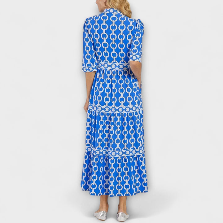 Exquisite women's midi dress with a golden chain pattern print. Elevate your summer fashion with this piece.