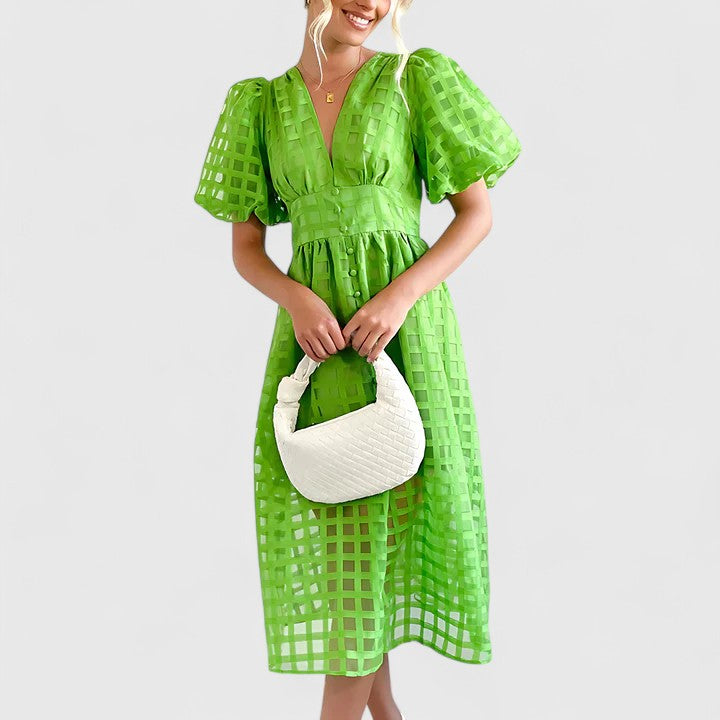 Stylish women's elegant midi dress. Perfect for spring and summer, offering a sophisticated, chic, and versatile look.