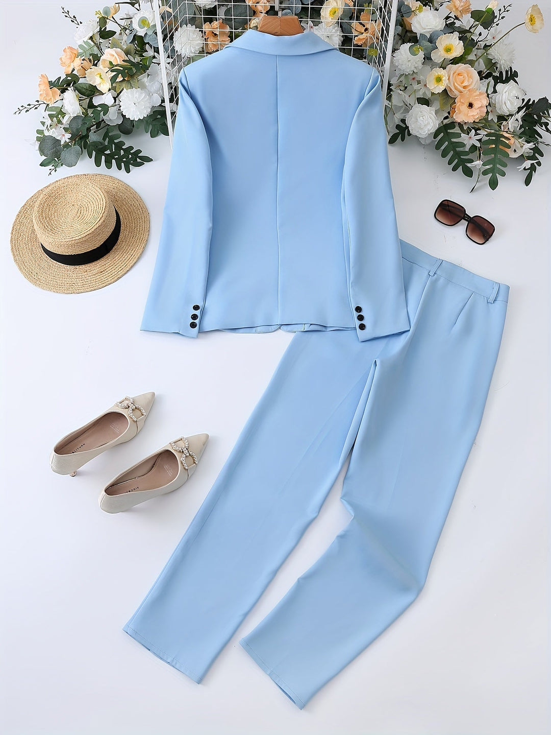 Elegant women's office wear: versatile notched lapel blazer & pant set for a polished professional style.