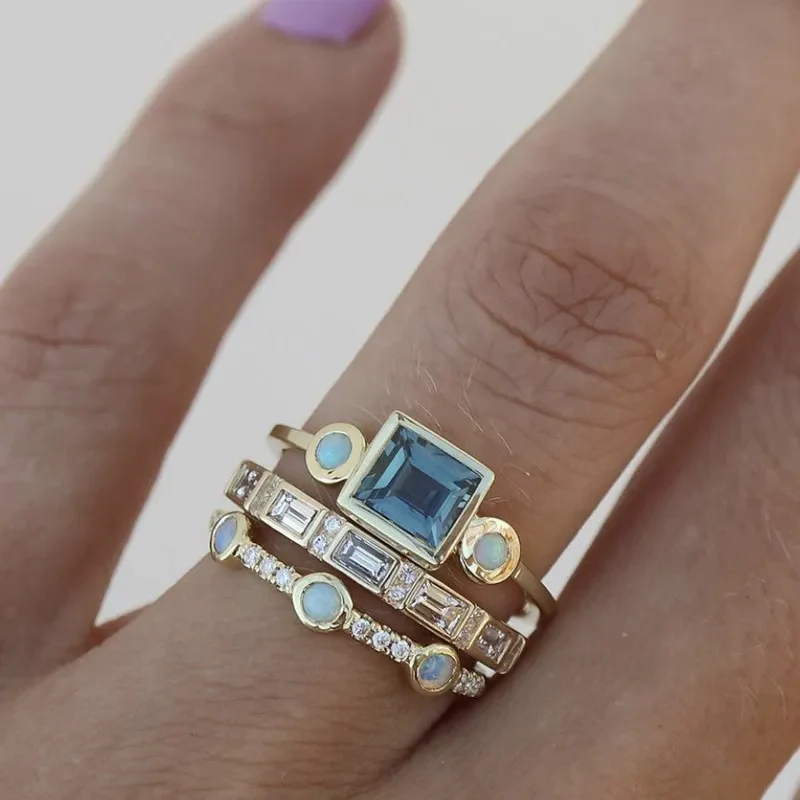 Elegant women's ocean wave blue crystal ring set. Vintage style fashion accessory for everyday wear, gift for her.