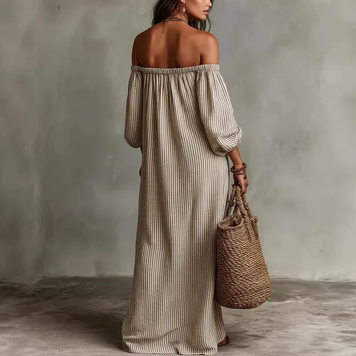 Flowy off-shoulder maxi dress for women, ideal for elegant vacation or casual summer wear.