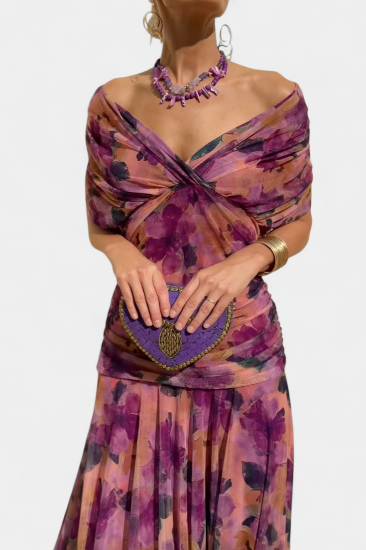 Beautiful women's off-shoulder cocktail dress, featuring a ruched body and stylish twist front.