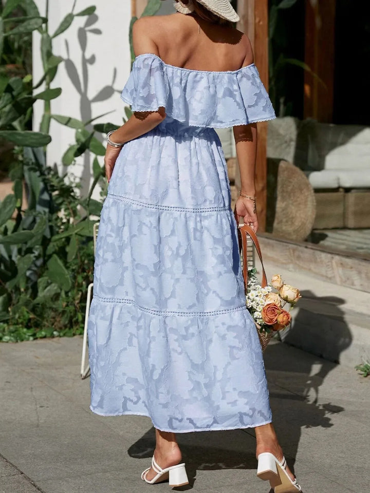 Dreamy off shoulder ruffle tiered maxi dress, offering a romantic and elegant look.