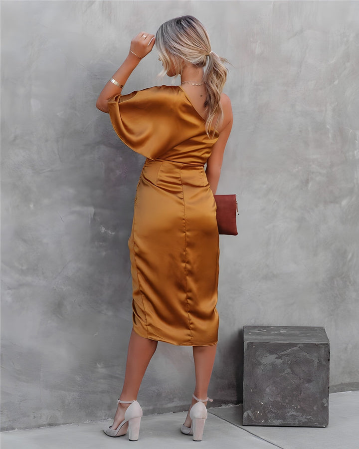 Flowing wrap design on a women's one shoulder midi dress, a comfortable & stylish choice.