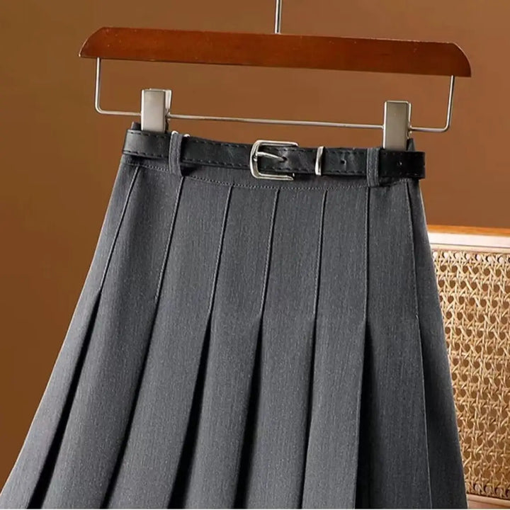 Stylish gray women's A-line midi skirt with delicate pleats, ideal for a sophisticated office look.