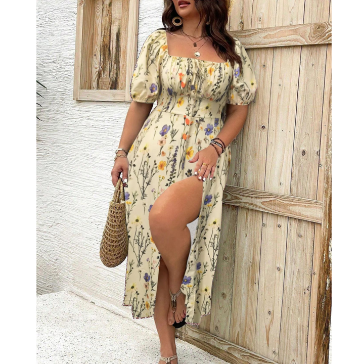 Flowing plus size maxi dress for women, featuring elegant puff sleeves. A versatile choice for day or evening.