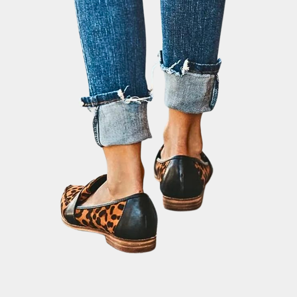 Sophisticated women's pointed-toe slip-on loafers, ideal for office or casual outfits.